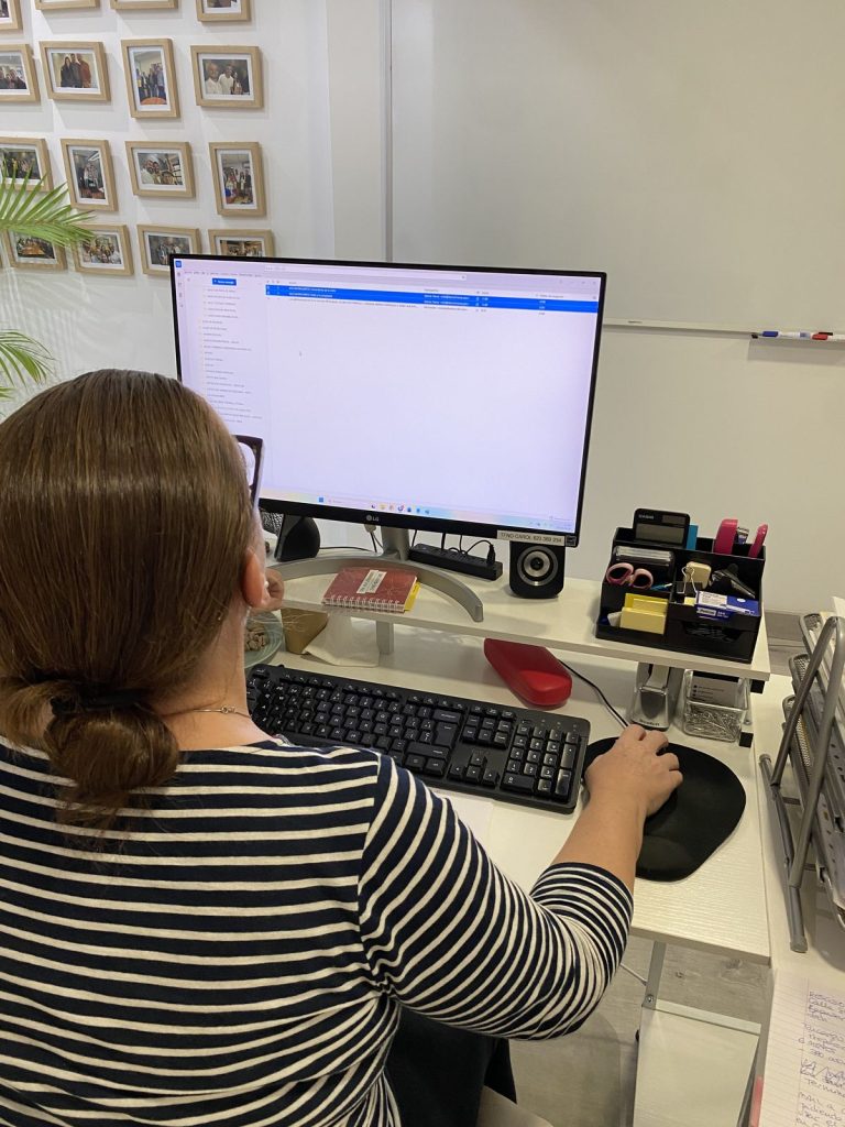 Wereal team managing files in the Alicante office